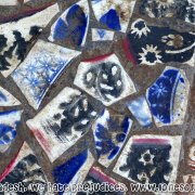 Floor mosaic made from broken porcelain